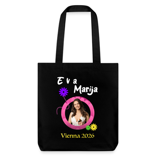A black heavyweight recycled tote bag  with a photo of singer Eva Marija on it